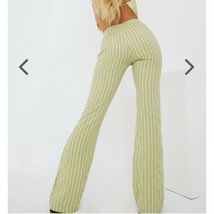 Green pinstriped trousers